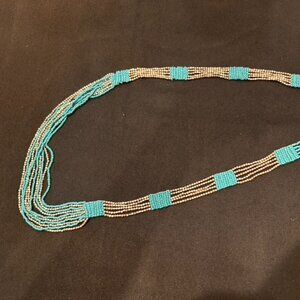 Multi-strand beaded turquoise and silver necklace